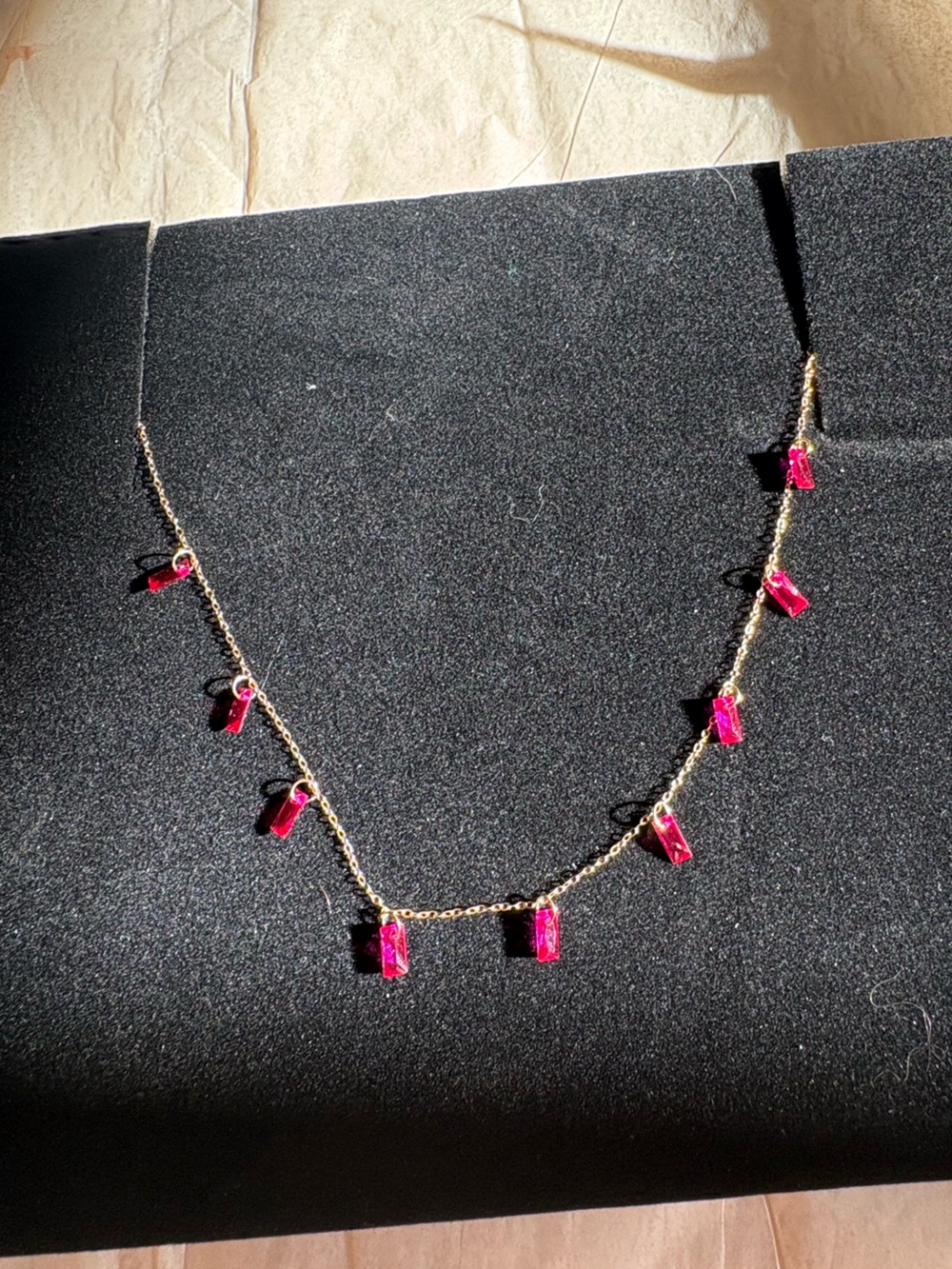 10k gold ruby necklace. 16 to 18 inches.